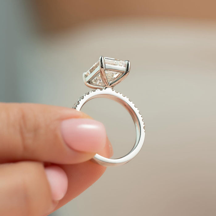 Emerald cut moissanite hidden halo pave band ring profile in white gold