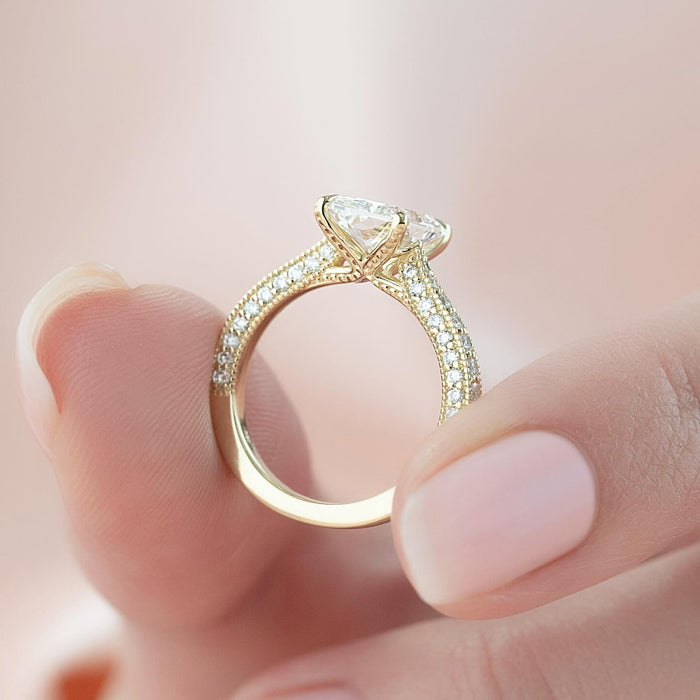 Radiant cut moissanite milgrain pave band ring profile in yellow gold