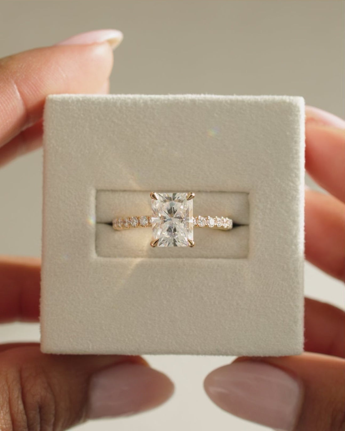 Radiant Cut Moissanite Hidden Halo Engagement Ring with Pave Set Band - view 1