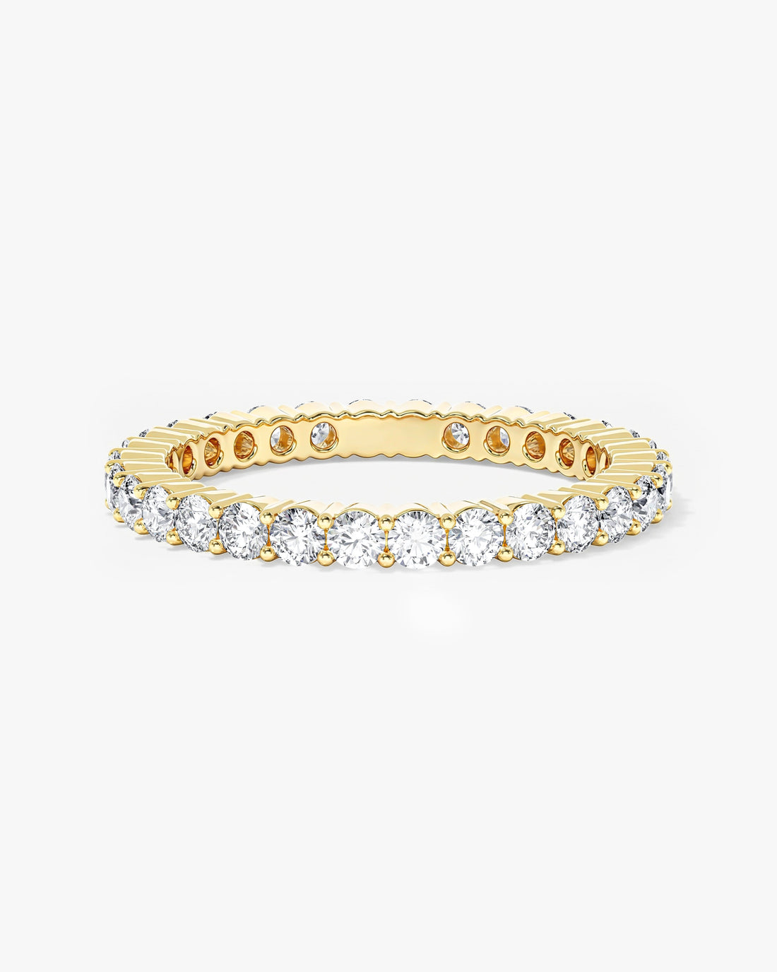 2mm round moissanite faceted eternity wedding band in yellow gold, front view