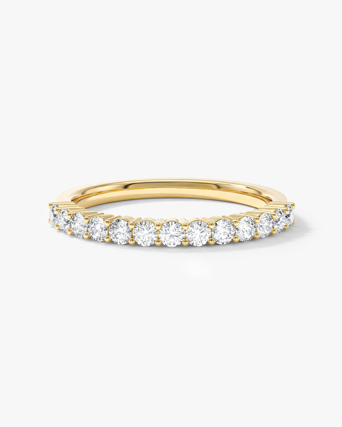 2mm round moissanite faceted half eternity wedding band in yellow gold, front view
