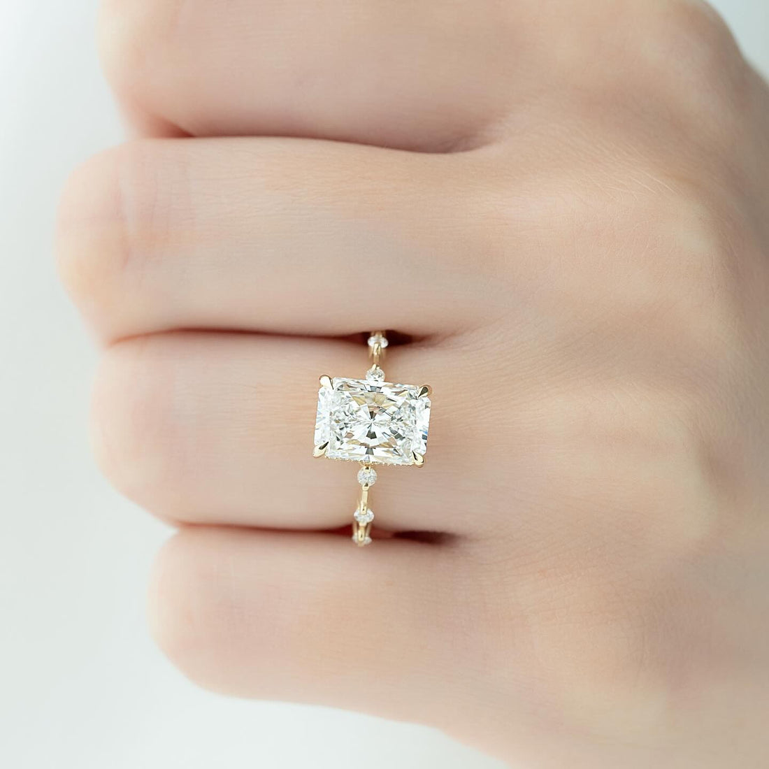 Radiant Cut Moissanite Hidden Halo Station Accent Ring in 14K Gold