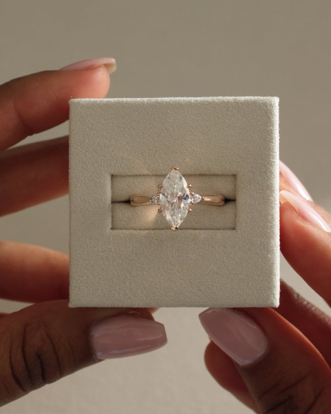 Marquise Cut Moissanite Three Stone Engagement Ring with Pear Side Stones - view 1
