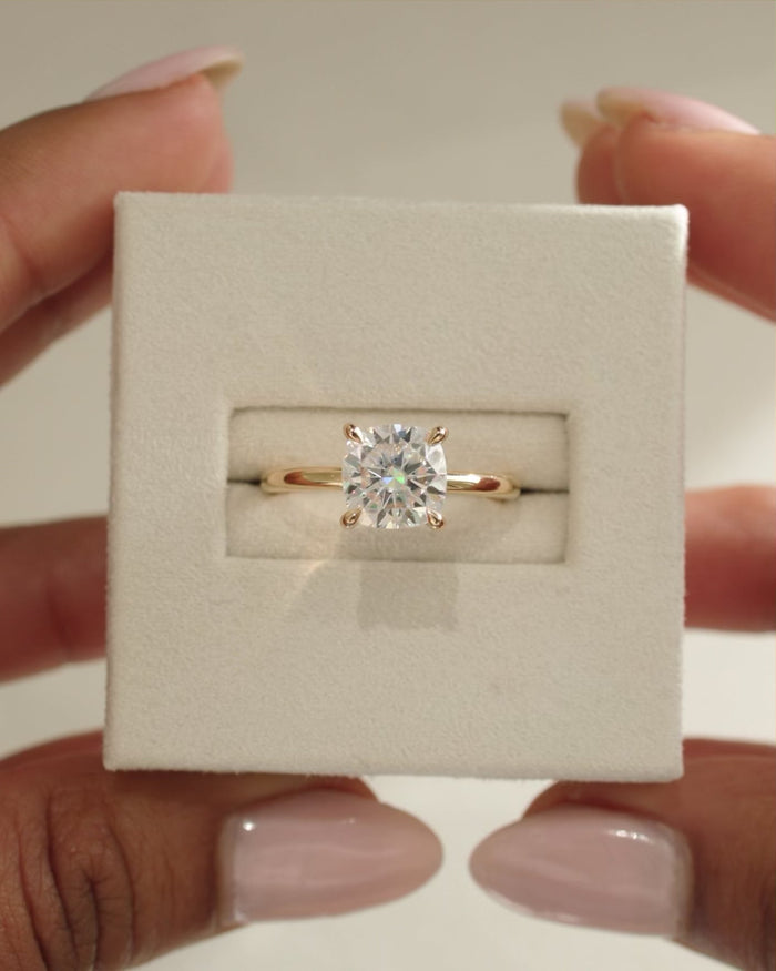 Cushion Cut Moissanite Four Claw Solitaire Engagement Ring with Slim Polished Band - view 1