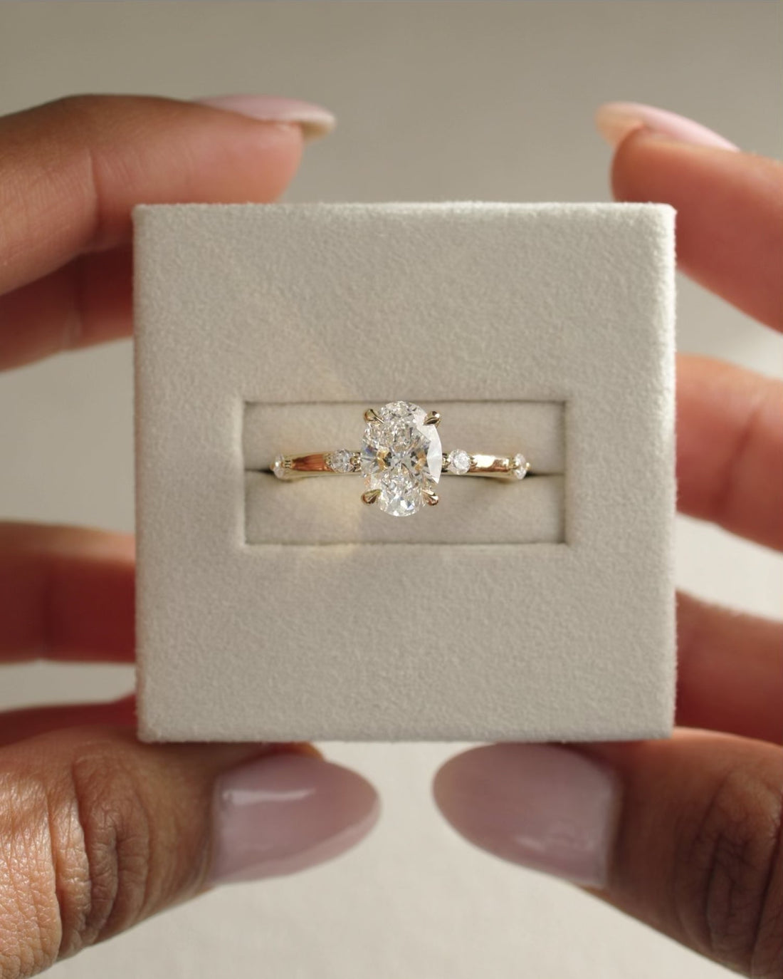 Oval Cut Moissanite Distance Pave Engagement Ring with Spaced Accent Stones - view 1