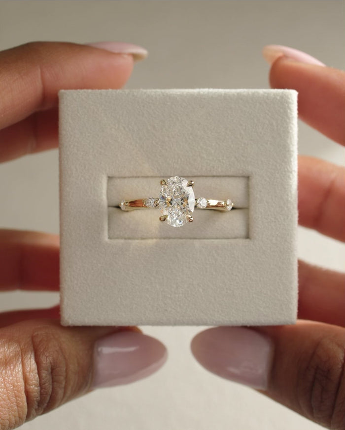 Oval Cut Moissanite Distance Pave Engagement Ring with Spaced Accent Stones - view 1