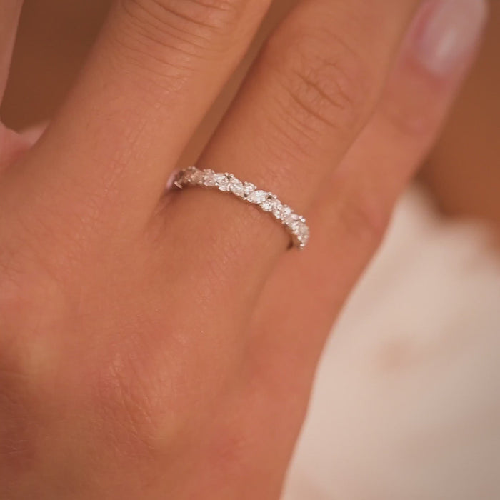Slim moissanite cluster band with marquise and round stones in white gold