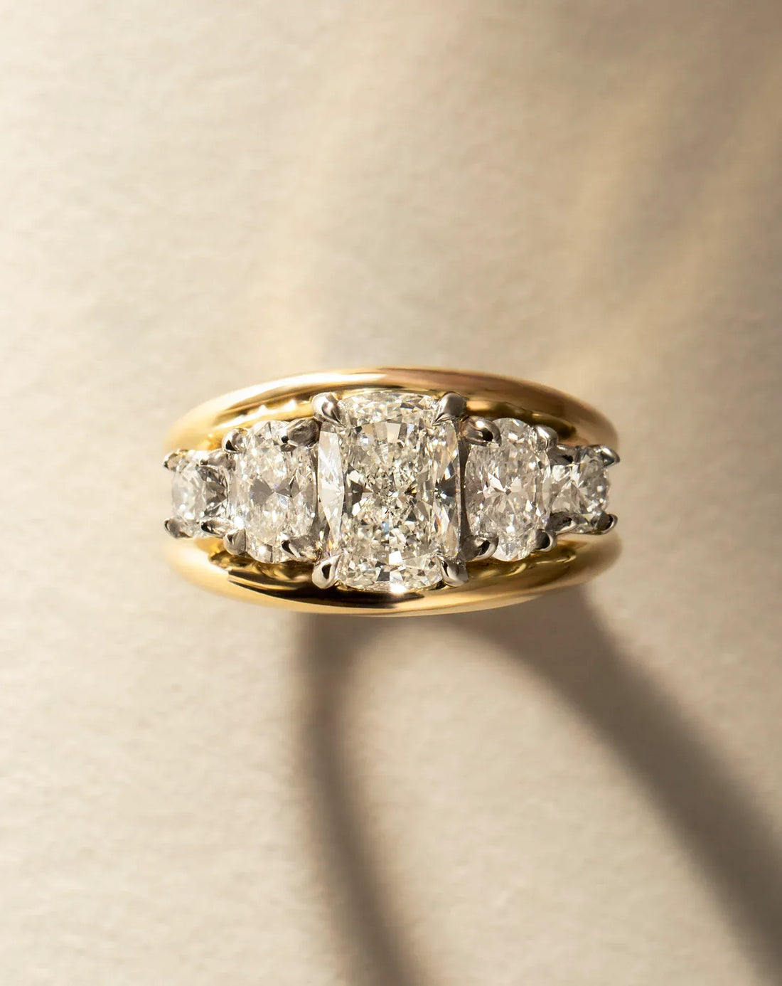 Elongated cushion cut lab grown diamond five stone double rail band ring in yellow gold
