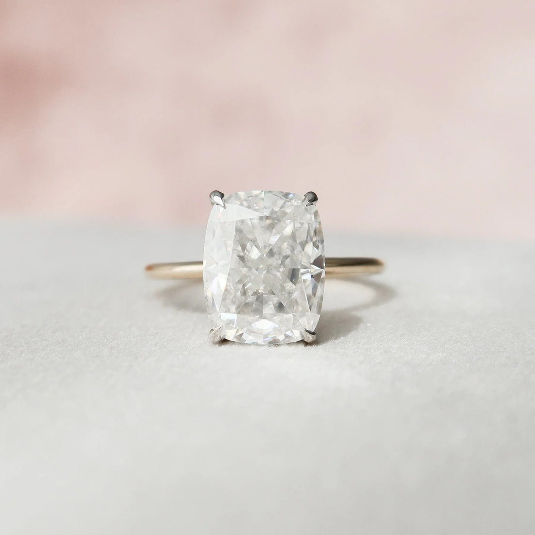 Solitaire elongated cushion cut moissanite engagement ring in gold