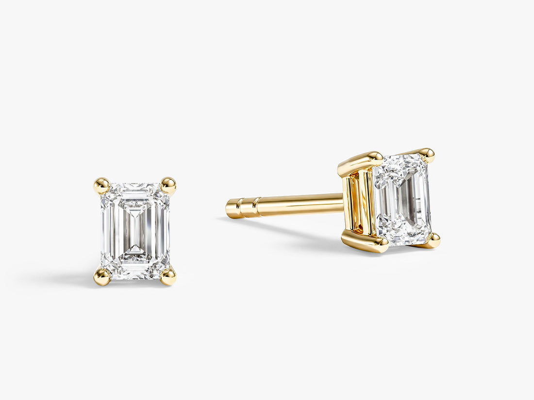 Pair of elegant emerald moissanite stud earrings for women in yellow gold