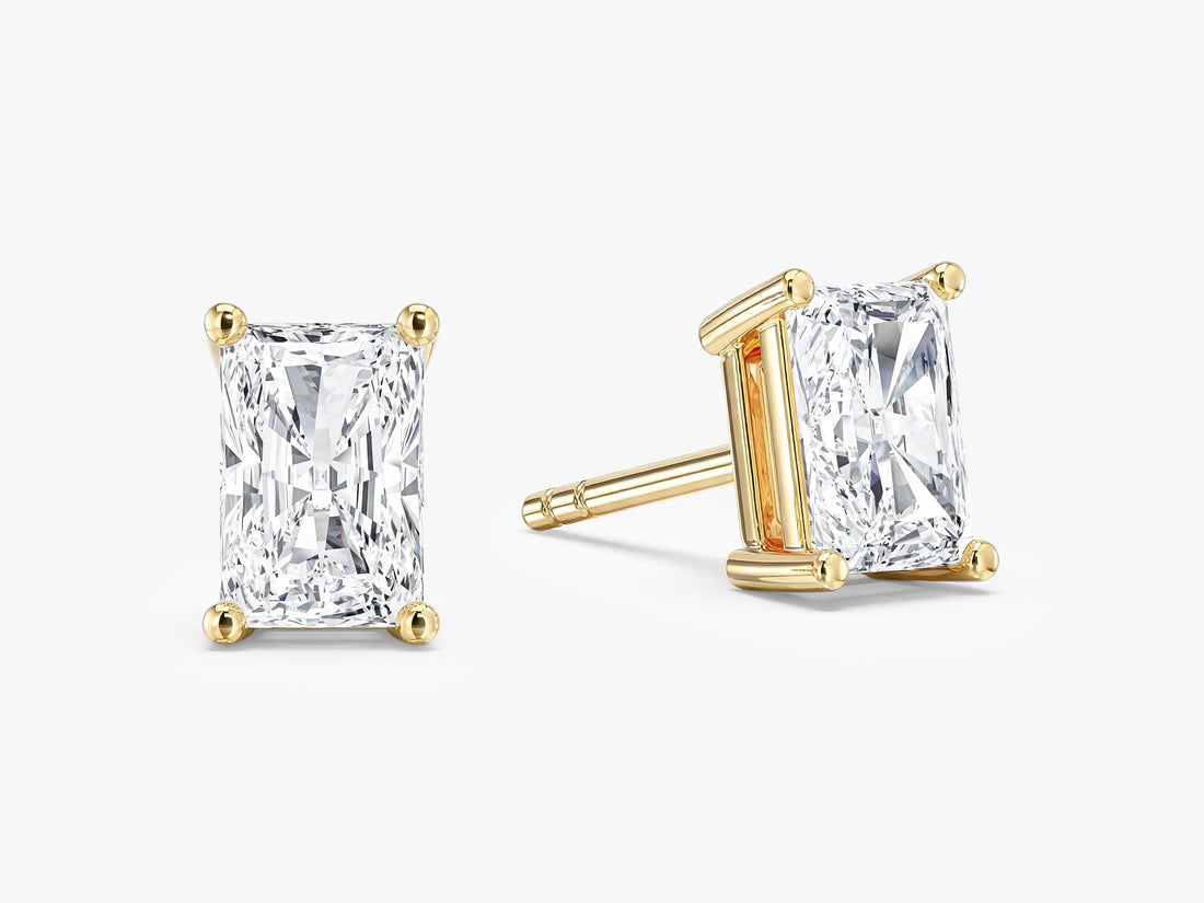 Pair of radiant cut moissanite solitaire stud earrings in yellow gold