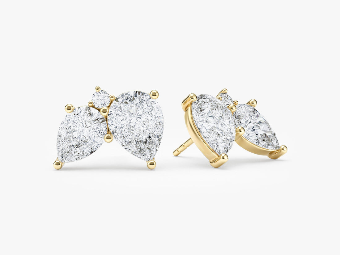 Pair of double pear moissanite cluster stud earrings in yellow gold