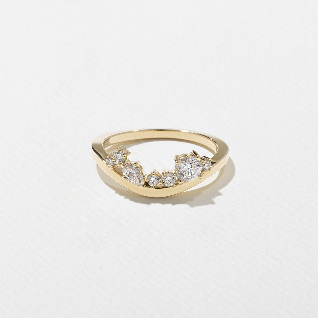 Round lab grown diamond curved cluster wedding band in yellow gold