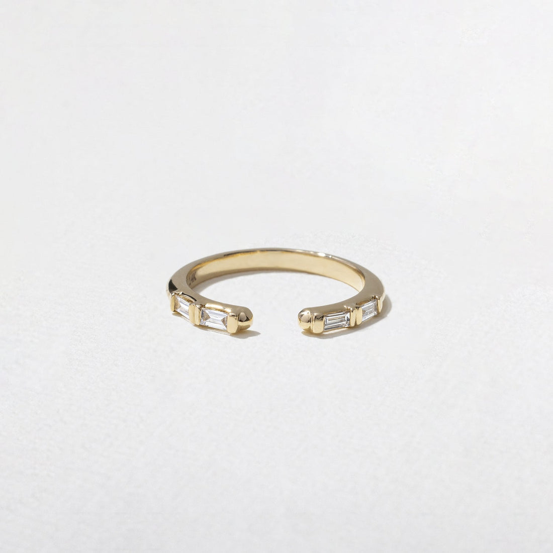 Baguette lab grown diamond open shank wedding band in yellow gold