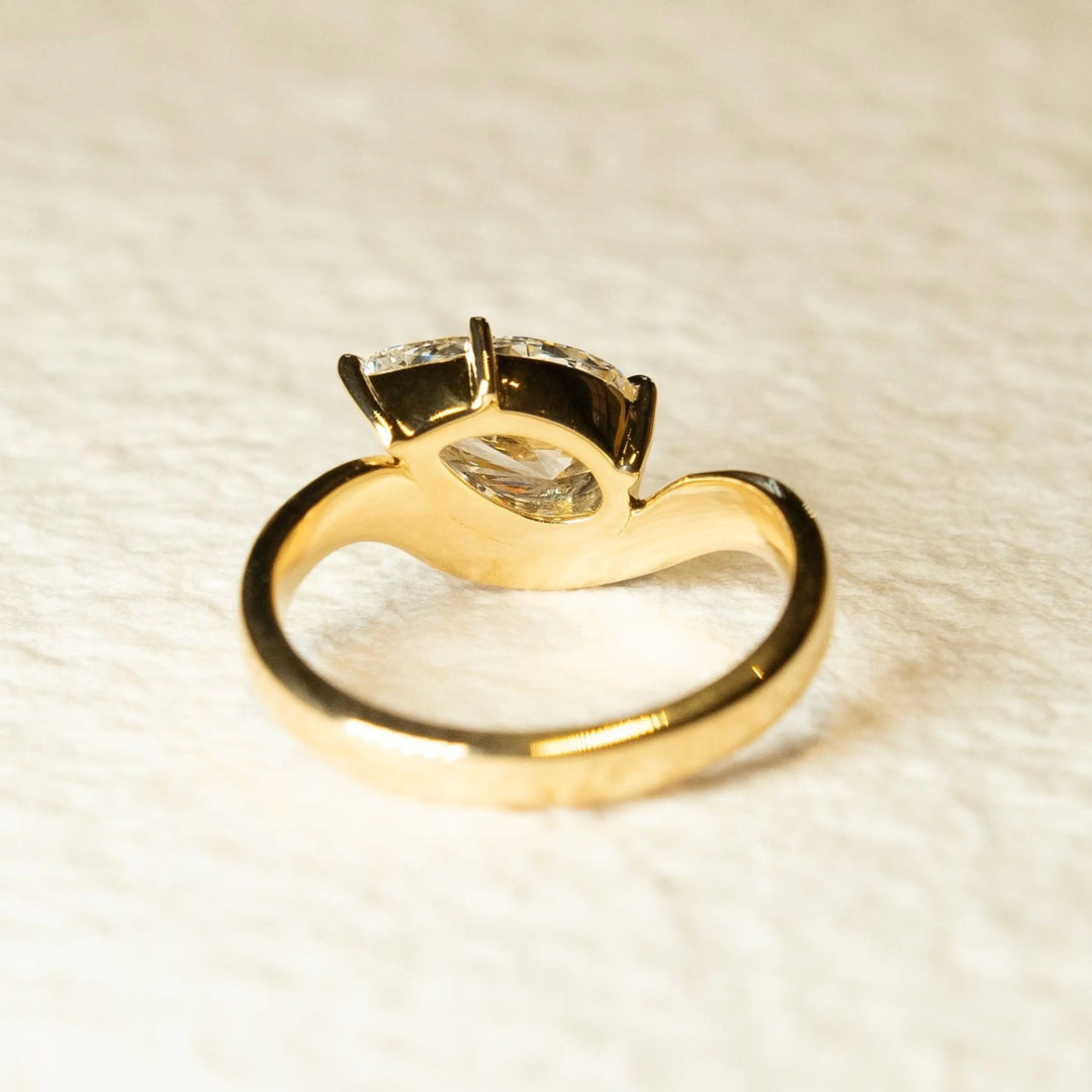 East West Pear Moissanite Solitaire Engagement Ring with Curved Stacking Wedding Band Set in 14K Gold