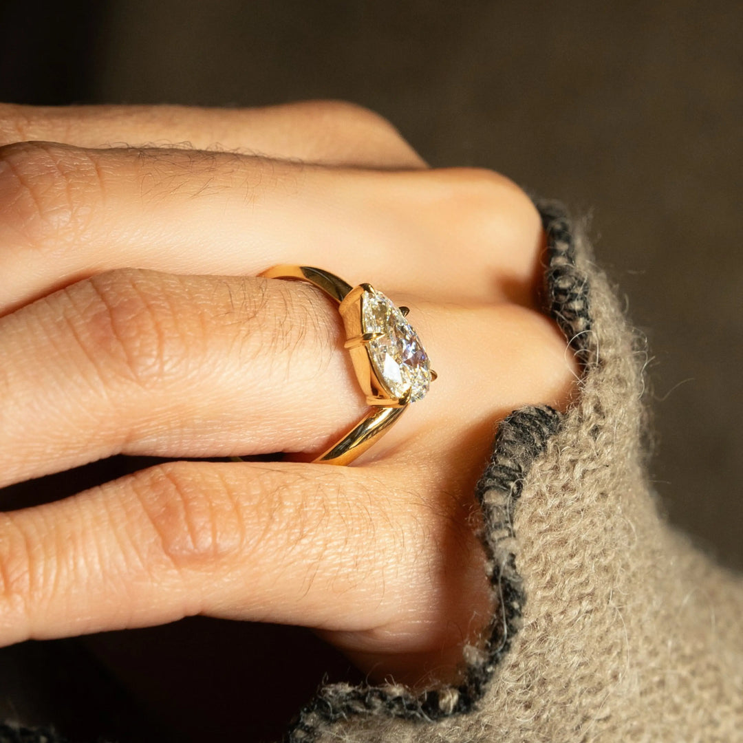 East West Pear Moissanite Solitaire Engagement Ring with Curved Stacking Wedding Band Set in 14K Gold