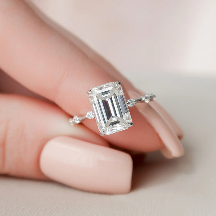 3.00 CT emerald cut moissanite engagement ring with distance pave in gold