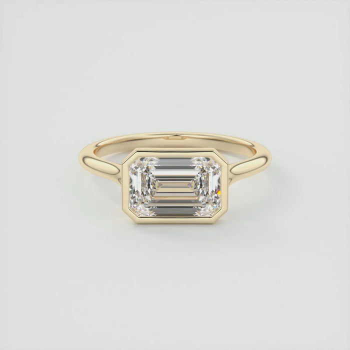 2.50 CT emerald cut moissanite east west engagement ring in gold