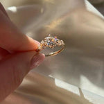 Load image into Gallery viewer, Conflict-Free Round Moissanite Ring with Side Stones


