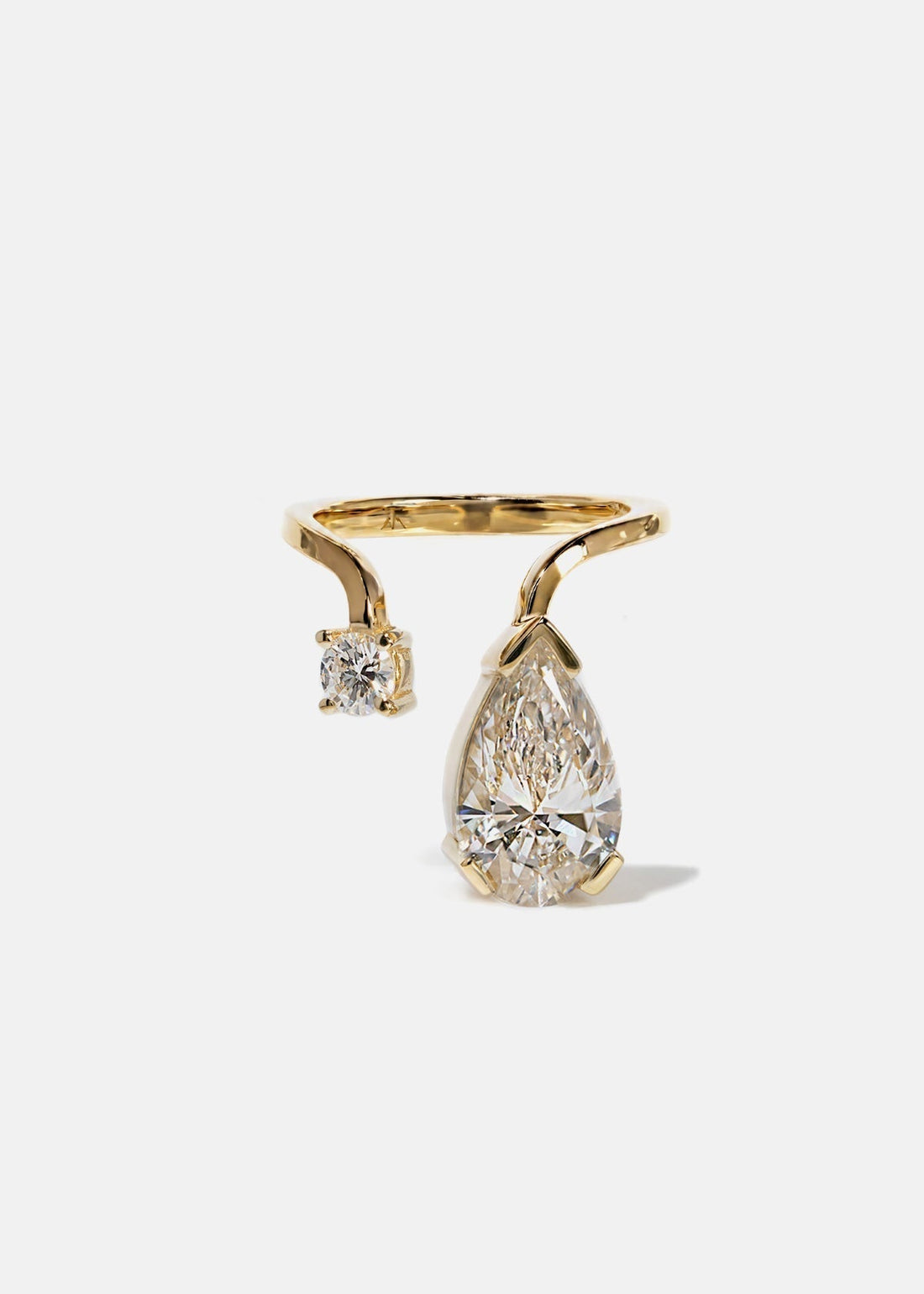 Pear and round cut lab grown diamond drop toi et moi engagement ring in yellow gold