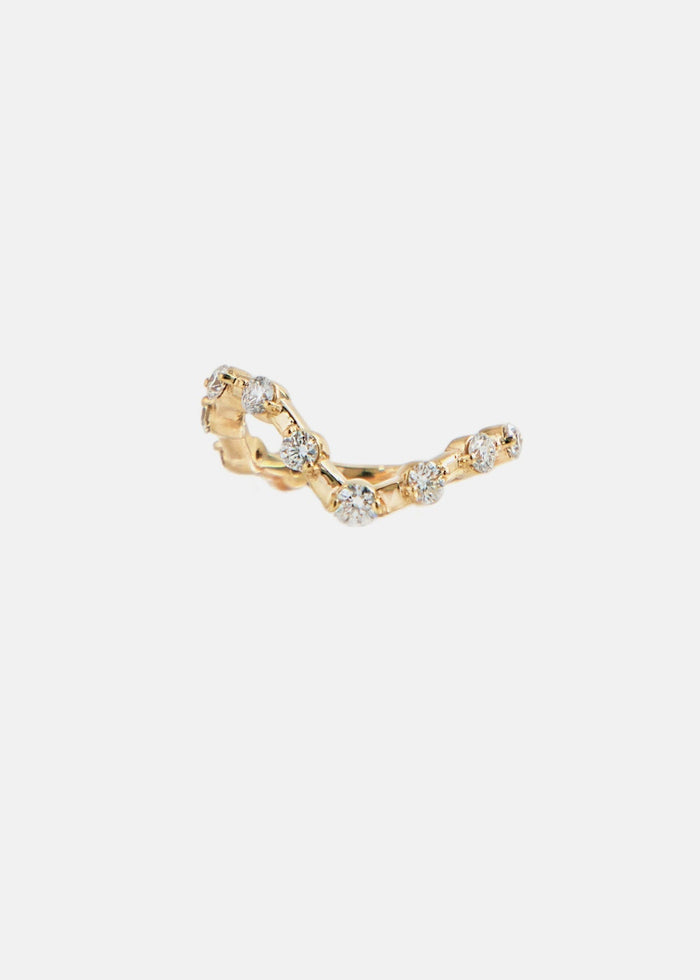 Round moissanite curved spaced stone wedding band in yellow gold
