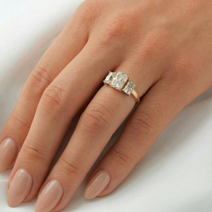 Three stone ring worn on the hand