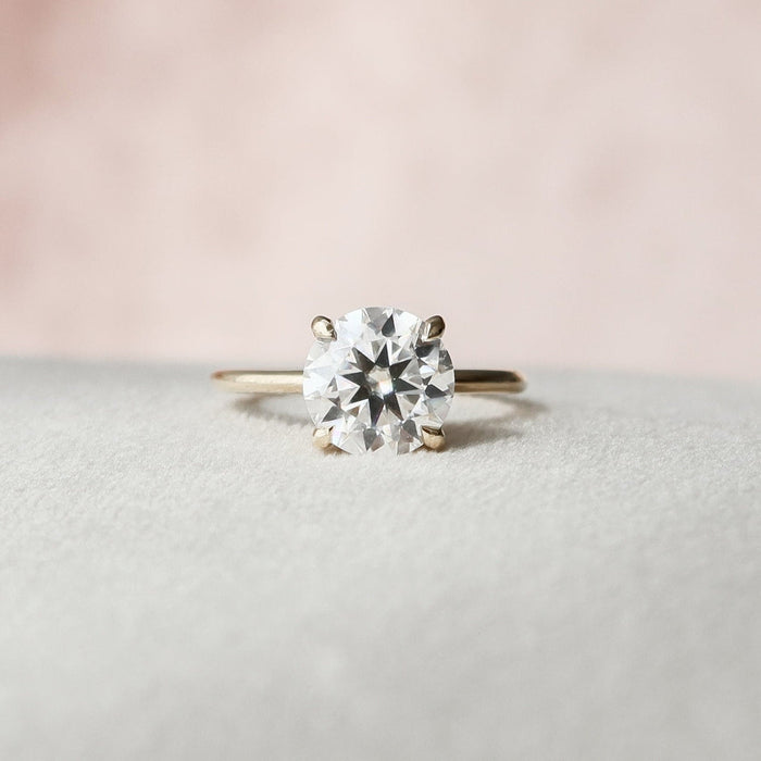 Round cut moissanite art deco anniversary ring in gold
