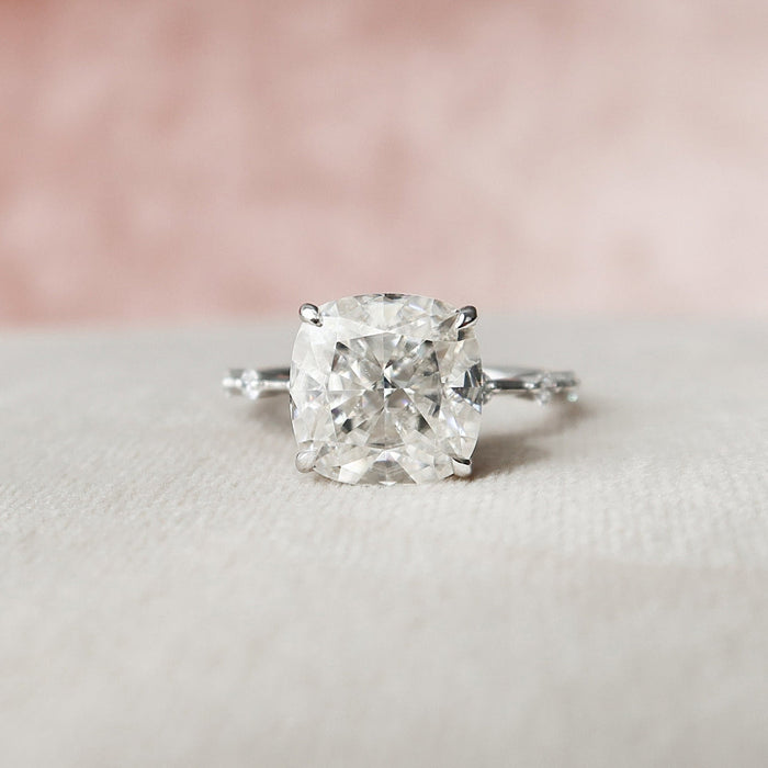 Elongated cushion cut moissanite distance pave engagement ring in gold