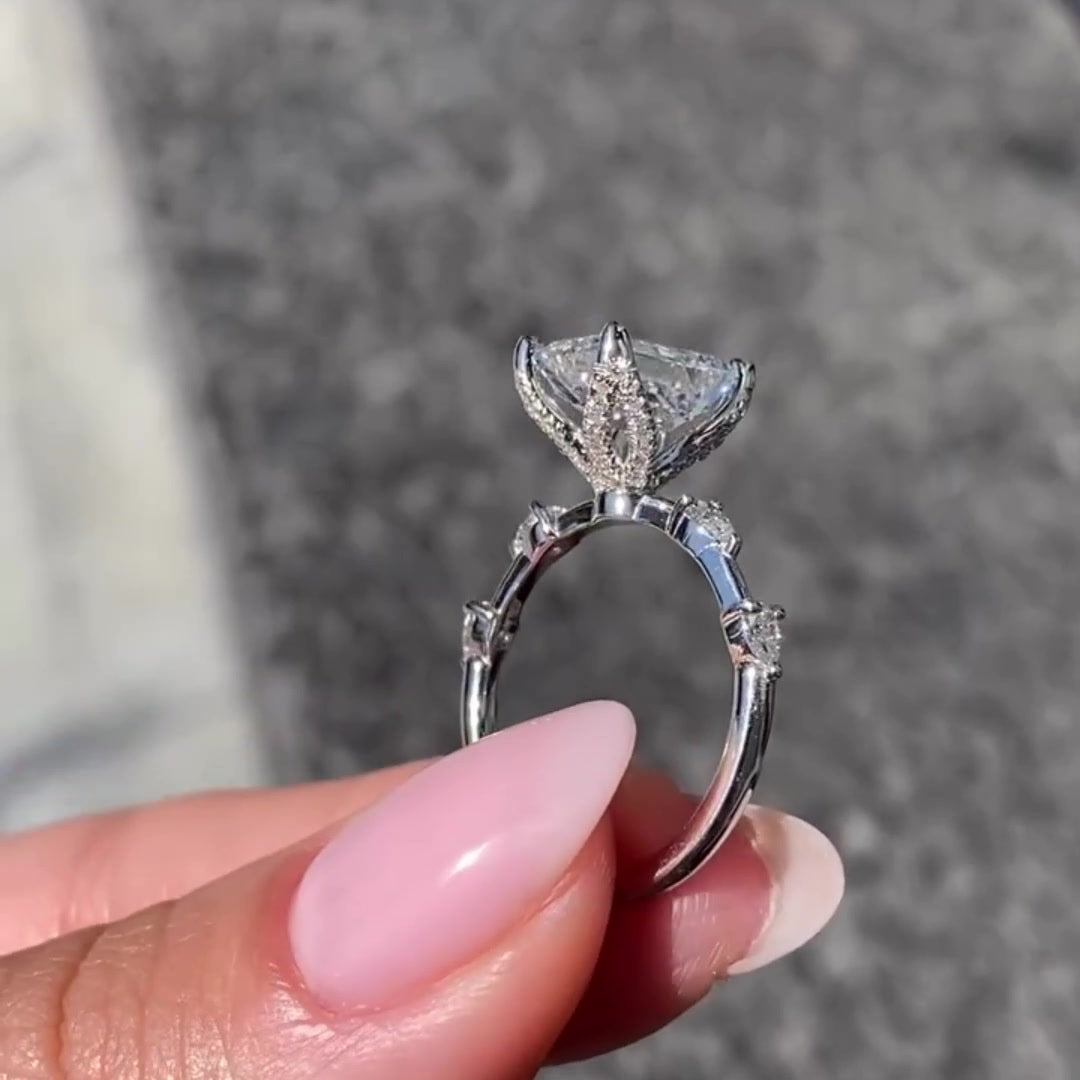 2CT emerald cut moissanite engagement ring with tulip setting in 14K gold