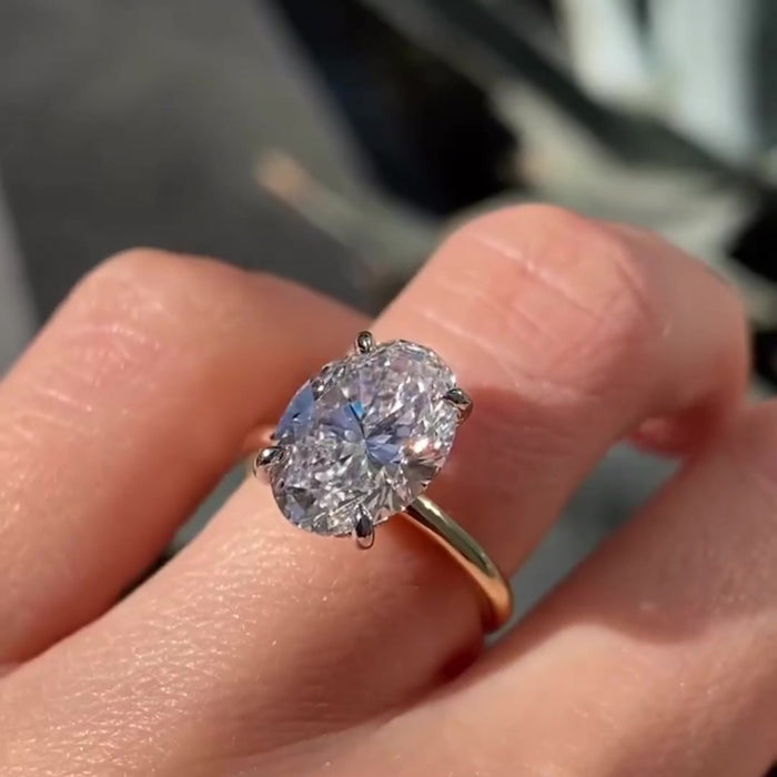 Oval cut moissanite solitaire ring in solid gold