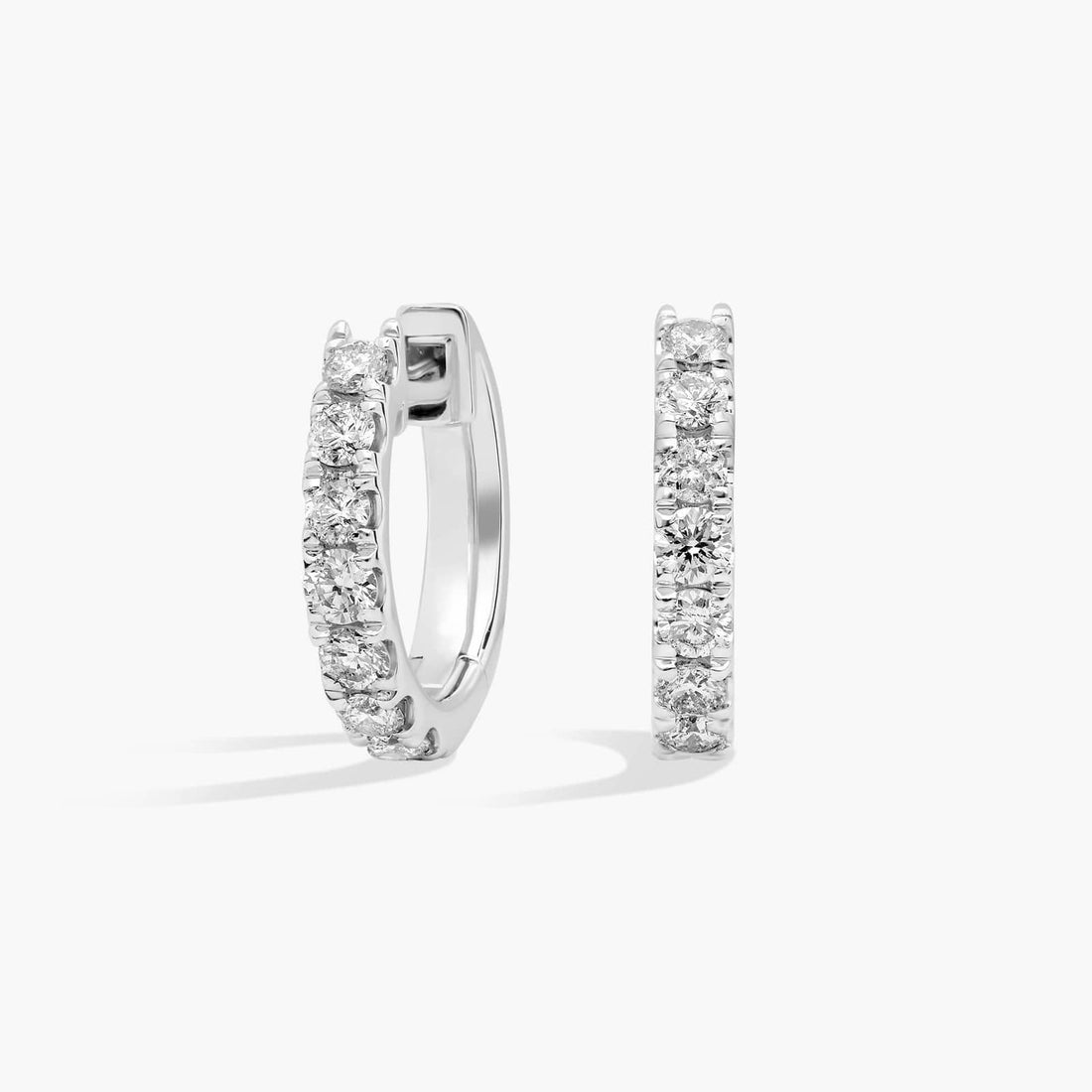 Round Cut Moissanite Graduated Pave Huggie Earrings - hero