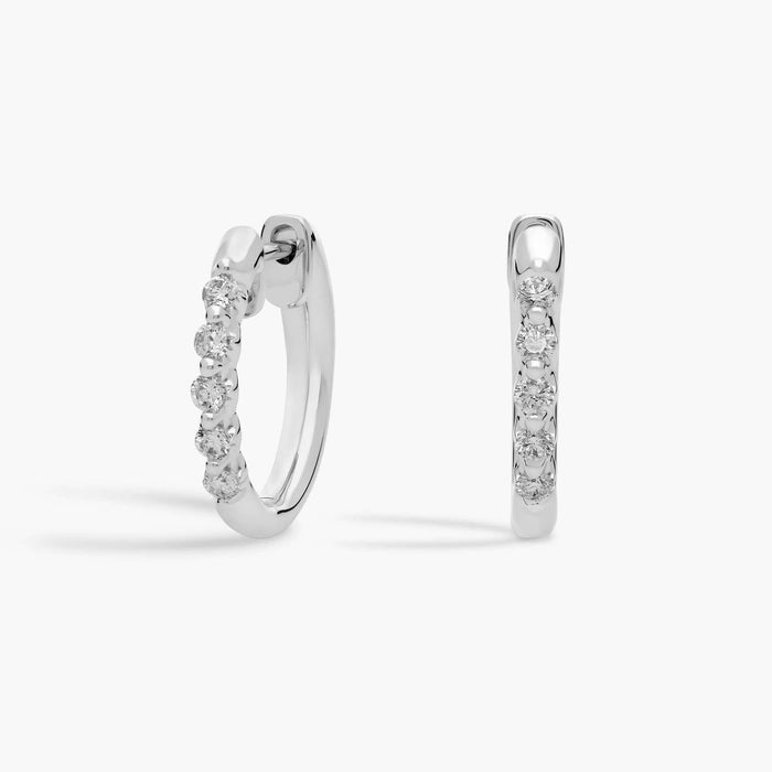 Round Cut Moissanite Star Huggie Earrings - hero