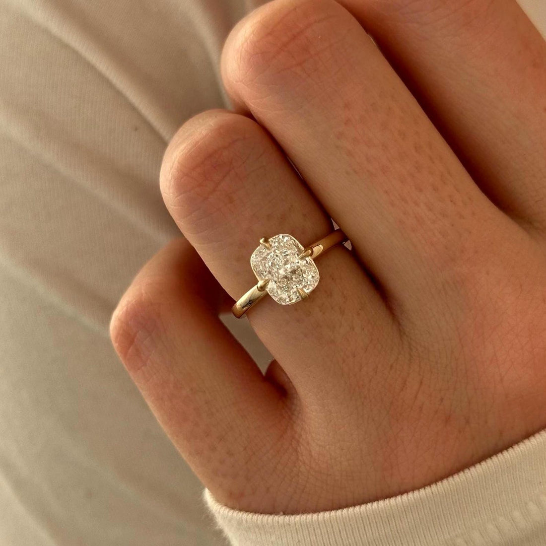 Elongated cushion cut lab grown diamond hidden halo solitaire ring