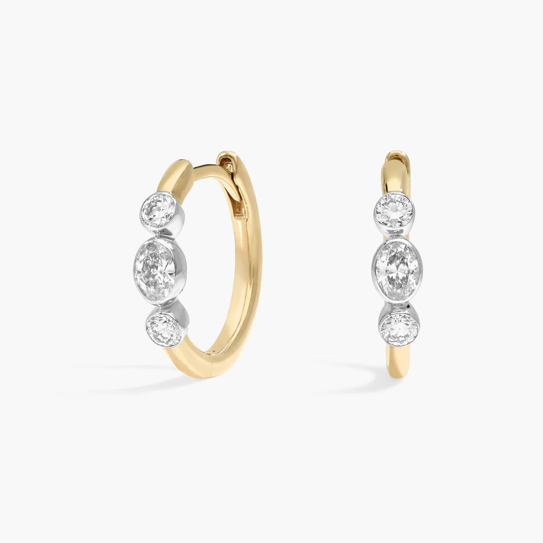 Oval Cut Moissanite Three Stone Huggie Earrings - hero