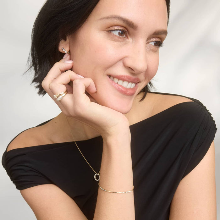 Oval Cut Moissanite Three Stone Huggie Earrings - view 2
