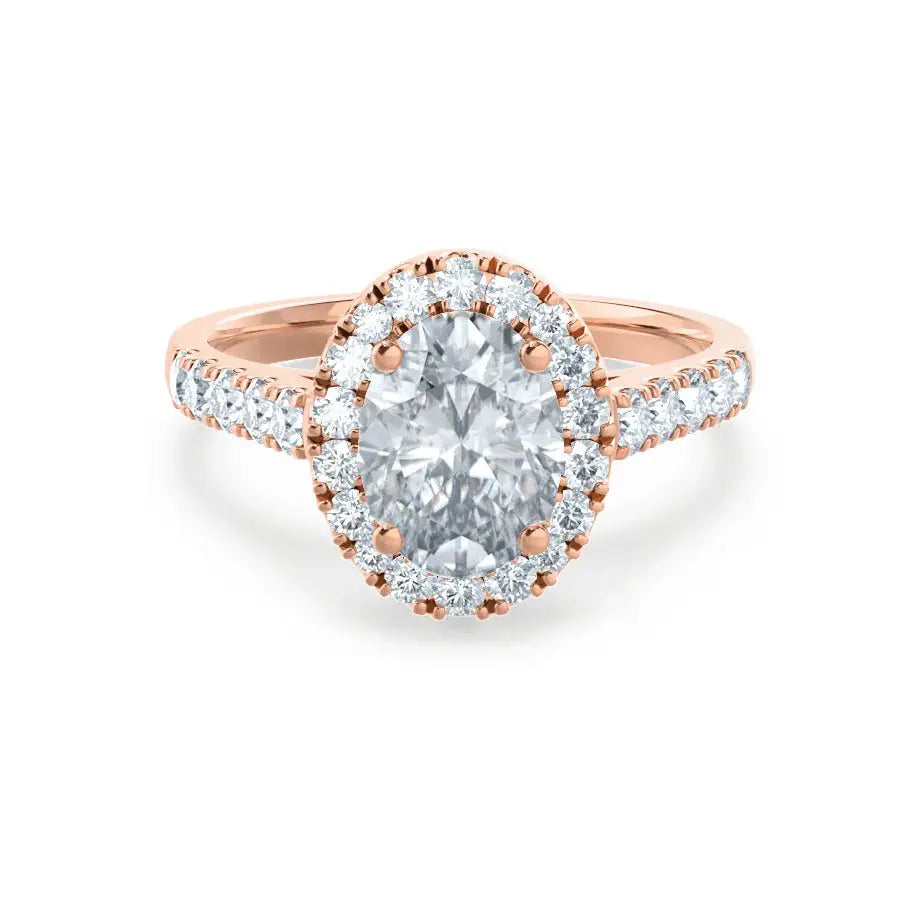 Oval cut moissanite halo engagement ring with vintage pave band in gold