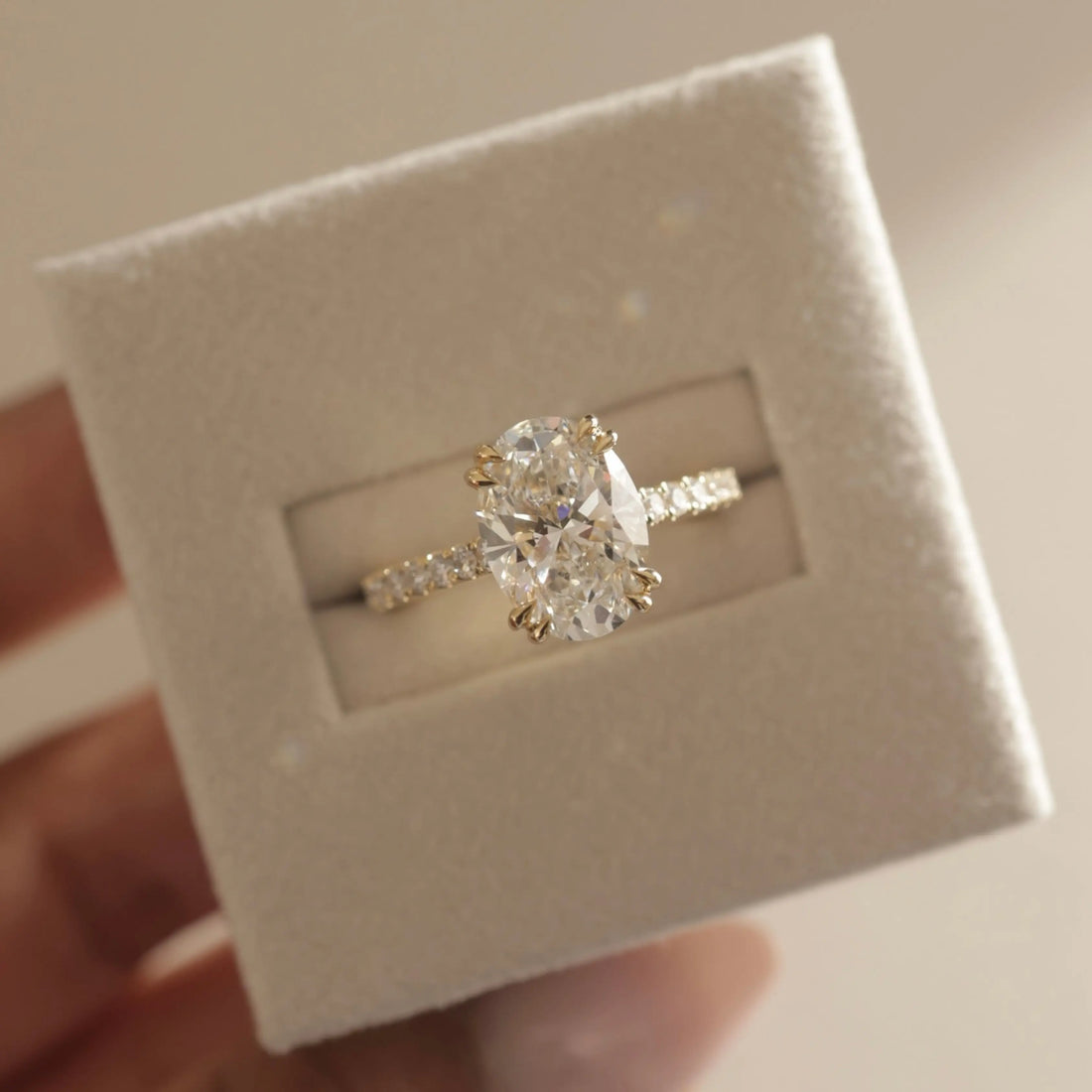 3 CT oval cut moissanite hidden halo engagement ring in gold