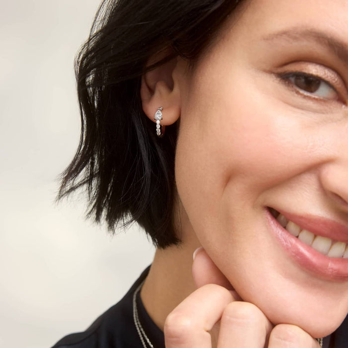Pear Cut Moissanite Center Huggie Earrings - view 2