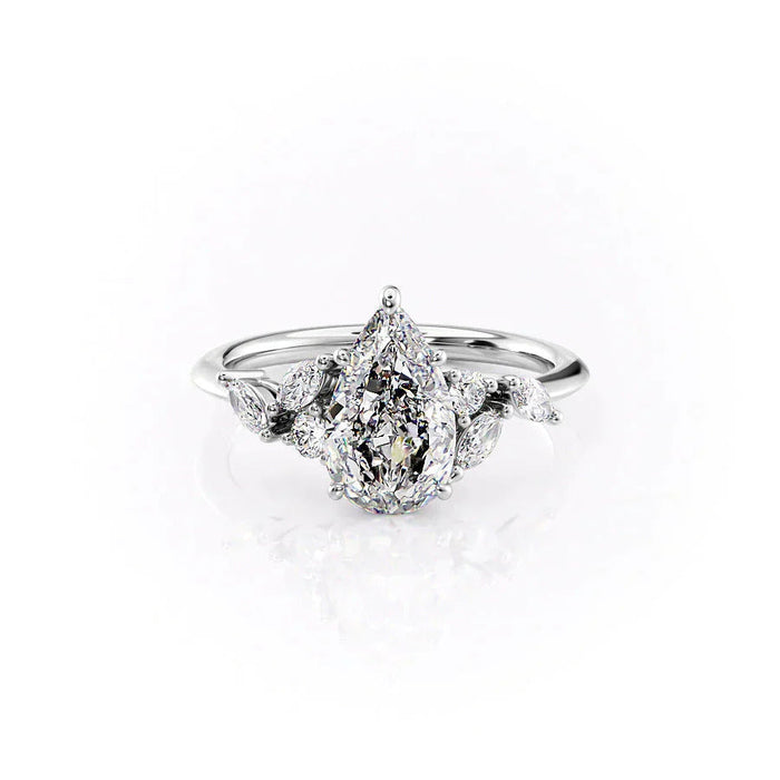 Pear shape moissanite cluster engagement ring in gold