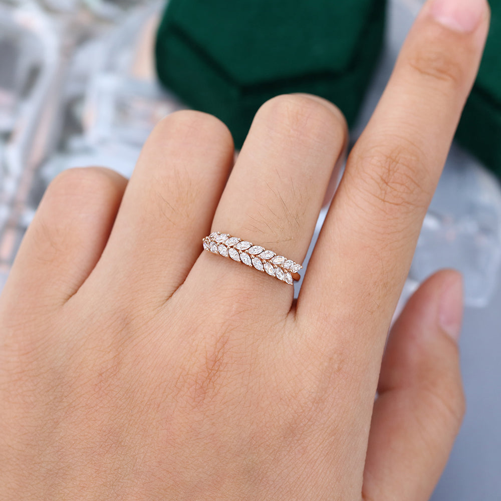 Marquise moissanite art deco double row leaf wedding band in rose gold worn on the finger
