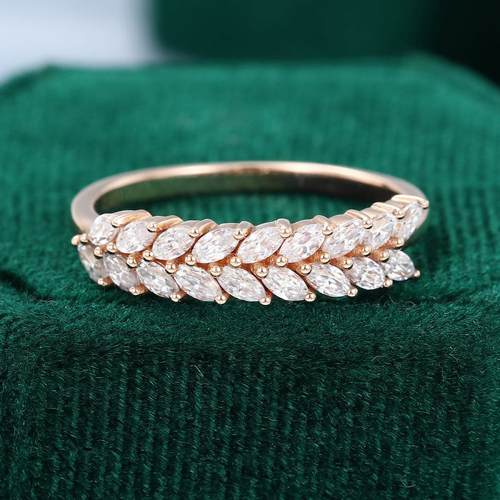 Front view of a marquise moissanite double row leaf wedding band in rose gold