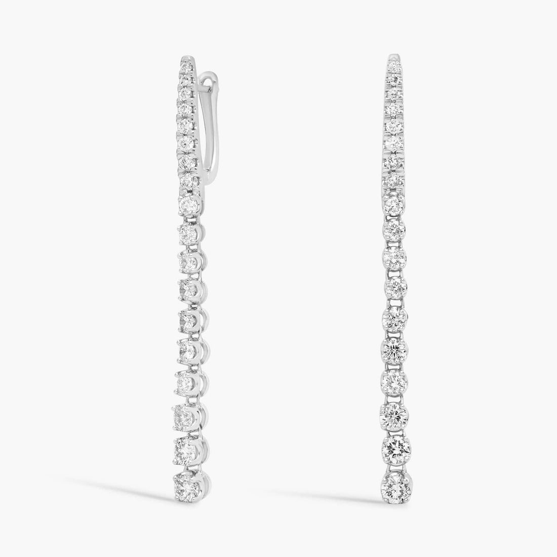 Round Cut Moissanite Graduated Drop Earrings - hero