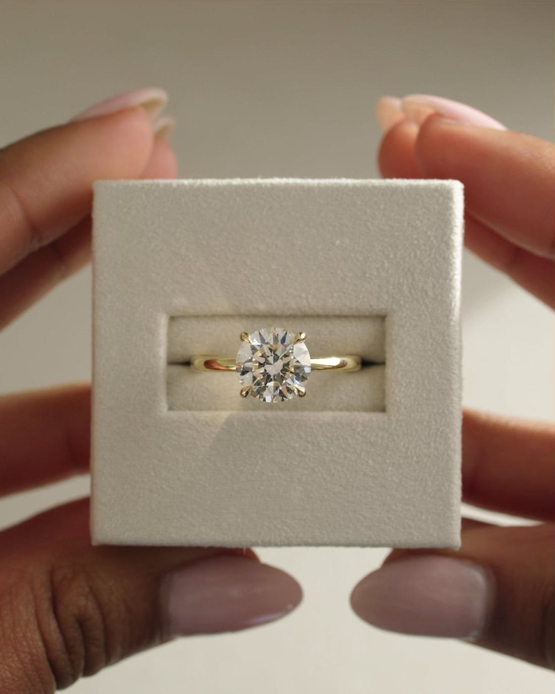 Round Cut Moissanite Four Claw Tapered Band Solitaire Engagement Ring - view 1