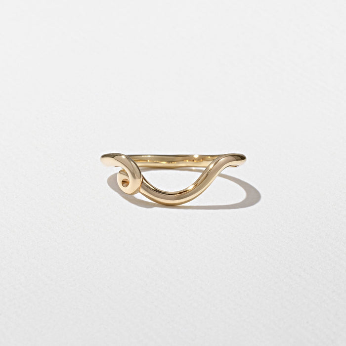 Curved scroll wedding band in yellow gold front view
