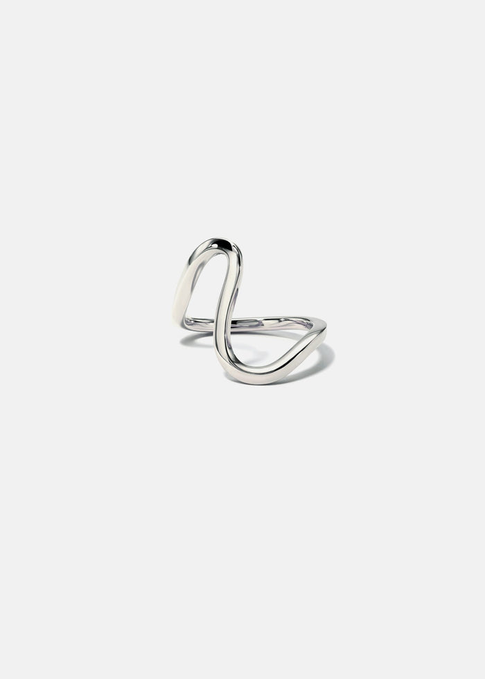 Curved wave wedding band in white metal front view