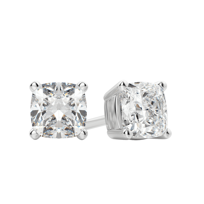 Close up of a pair of white gold cushion cut lab grown diamond stud earrings in four prong settings