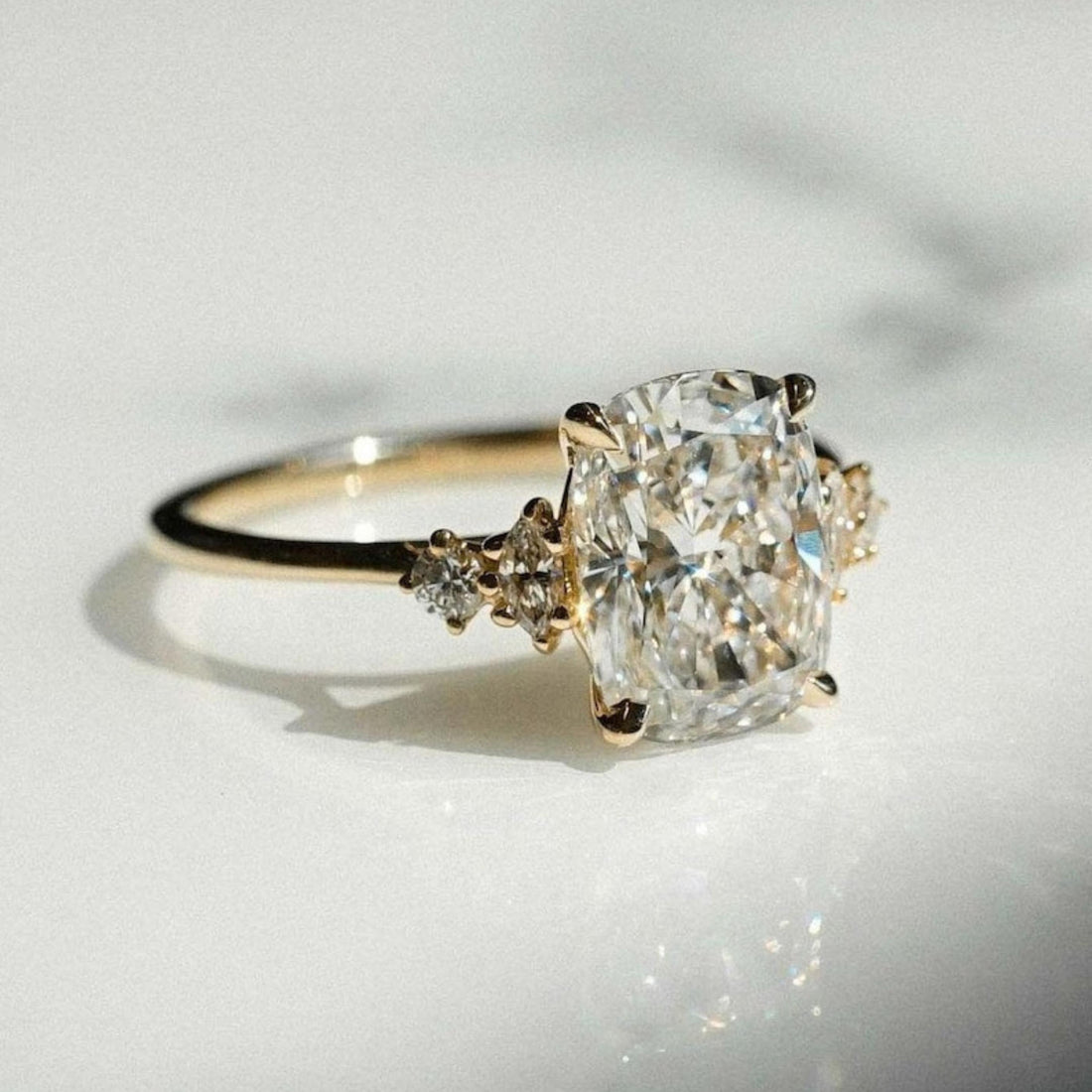 Cushion cut lab grown diamond five stone engagement ring