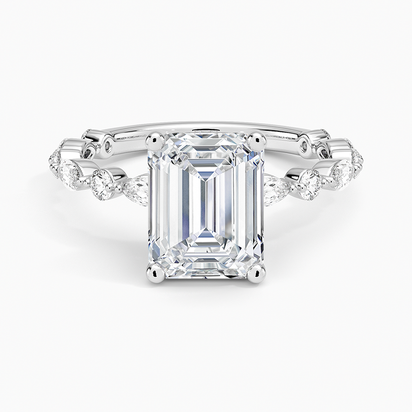 Emerald cut lab grown diamond ring in white gold on a marquise and round eternity band, top view