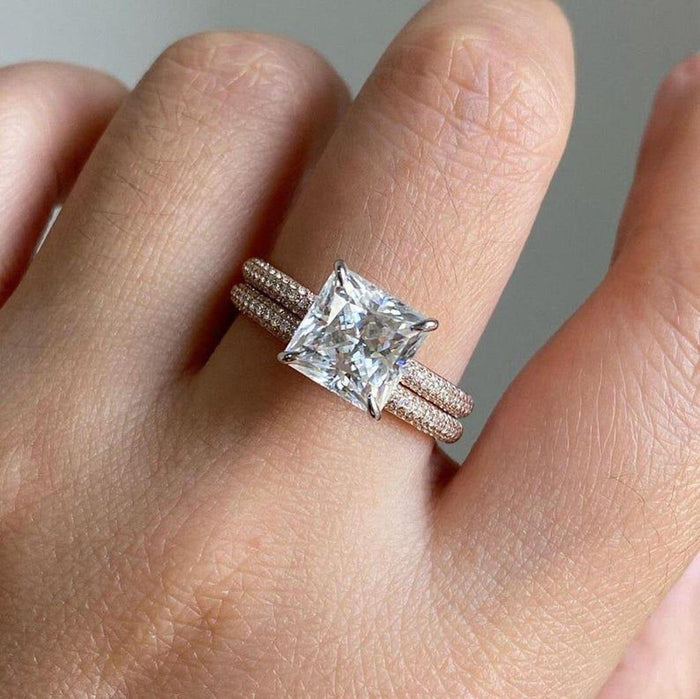 Engagement ring and matching wedding band nested together