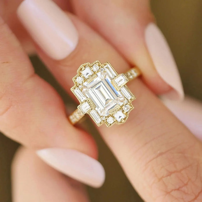 Stepped geometric halo of baguettes around the emerald cut lab grown diamond